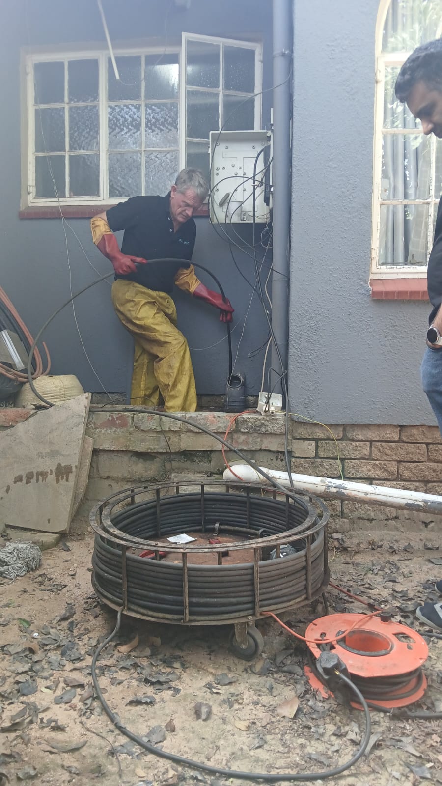 Signs of a blocked drain: standing water and slow drainage at a Sandton residential property